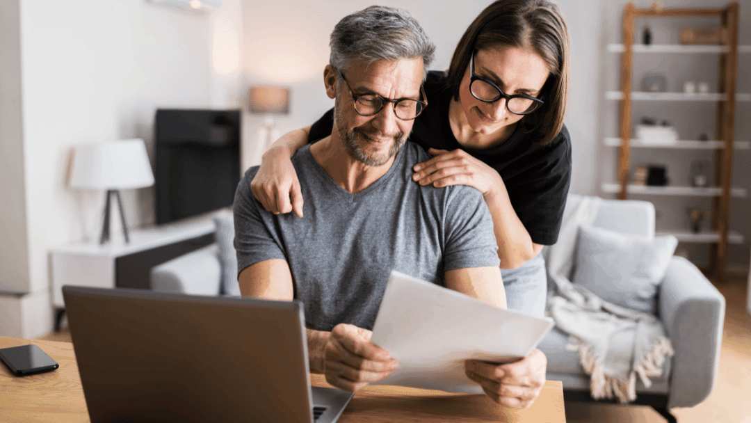 a couple just finishing their taxes