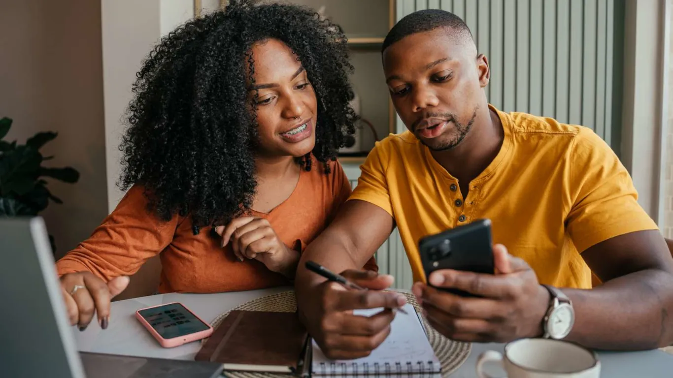 Married couple calculating if filing jointly or separately can bring more savings