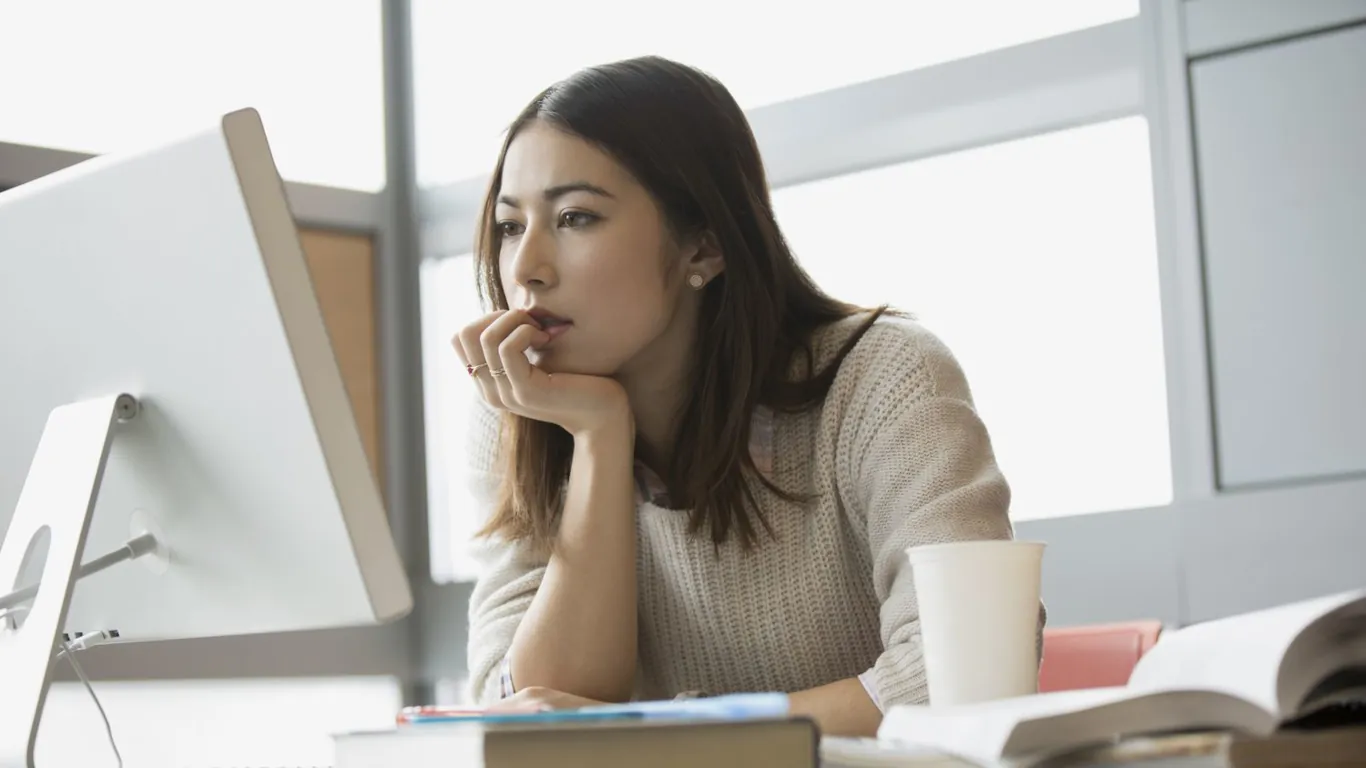 Female taxpayer thinking about Single or Head of Household