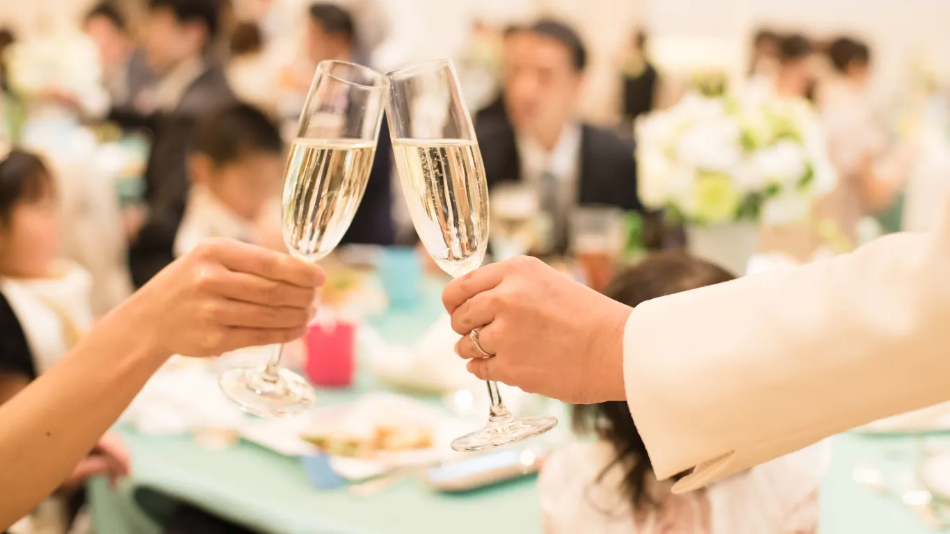 Bride and groom toasting during their wedding