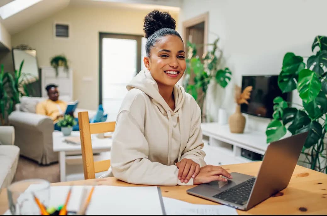 Hispanic Woman Using Laptop